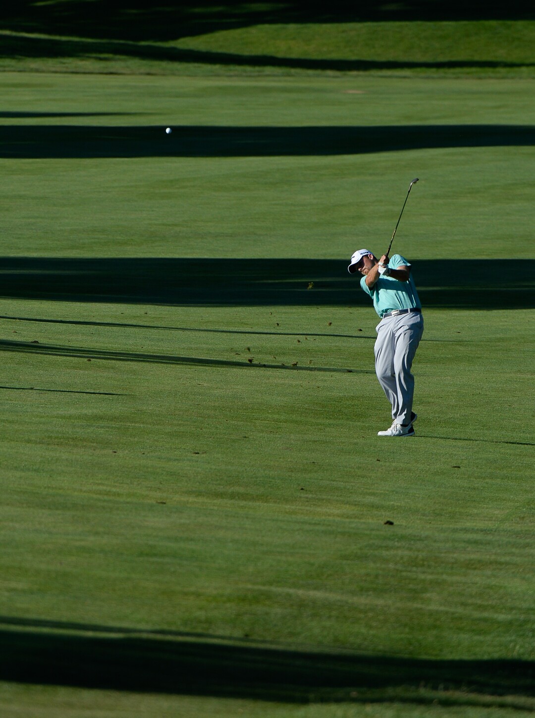(Francisco Kjolseth  |  The Salt Lake Tribune)  Steven Ihm of Peosta, IA, drives the ball past the shaded bands on the 18th hole during the Utah Championship golf event on the Web.com Tour at Oakridge Country Club in Farmington on Sunday, July 15, 2018, on his way to capturing second place one stroke behind Cameron Champ. 
