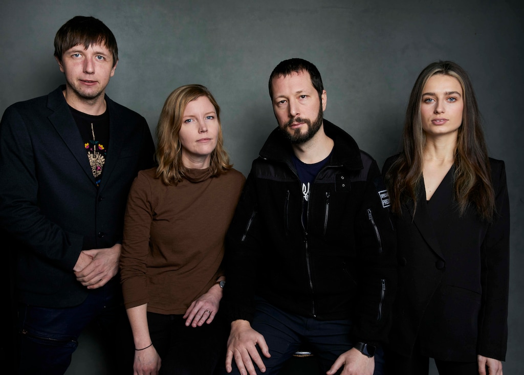 (Taylor Jewell | Invision/AP) Photographer Evgeniy Maloletka, from left, "Frontline" producer/editor Michelle Mizner, director Mstyslav Chernov, and field producer Vasilisa Stepanenko pose for a portrait to promote the film "20 Days in Mariupol" at the Latinx House during the Sundance Film Festival on Sunday, Jan. 22, 2023, in Park City.