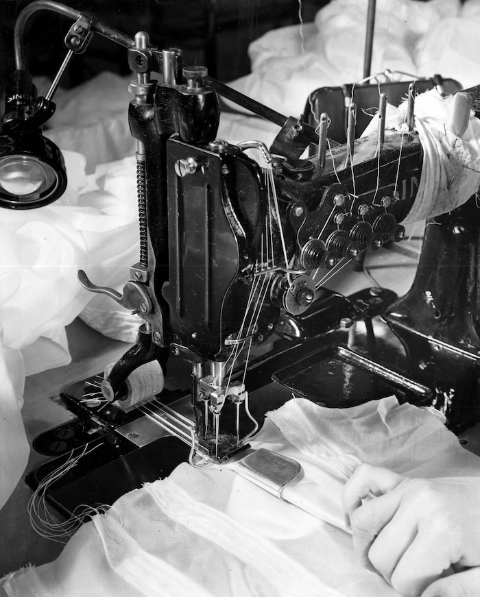 (Photo courtesy of the Utah State Historical Society) A parachute is seen as it is being sewn together at the parachute plant in Manti in the mid-1940s.