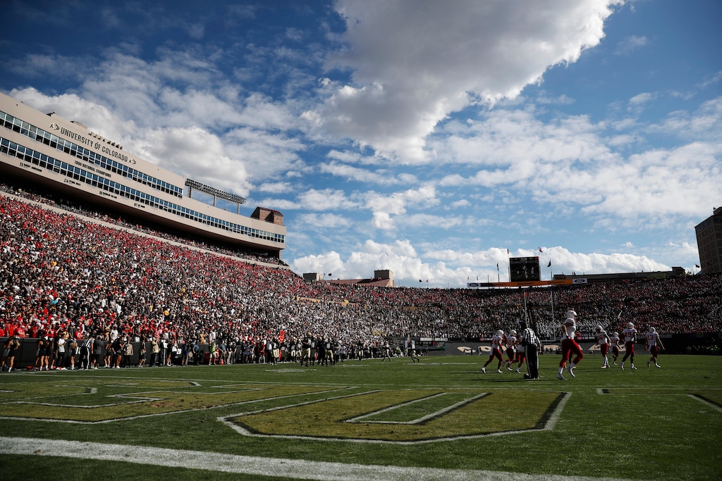 (David Zalubowski | AP) A cloud hangs over Folsom Field in the second half during a 2019 game between Nebraska and Colorado in Boulder, Colo.