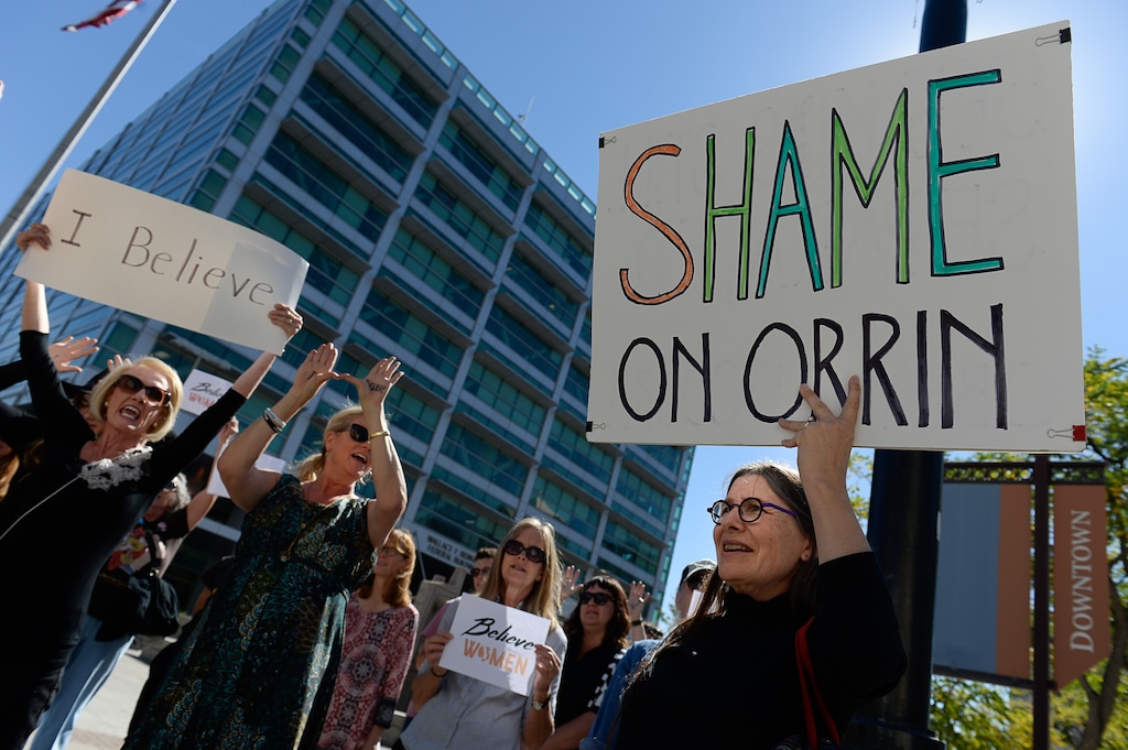 (Francisco Kjolseth | The Salt Lake Tribune) Liz Rank, right, joins a group of mostly women at the Wallace F. Bennett Federal Building in Salt Lake City to protest against Supreme Court nominee Judge Brett Kavanaugh on Thursday, Sept. 27, 2018.