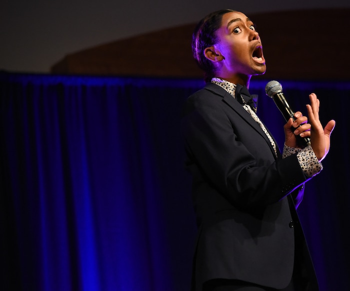 (Francisco Kjolseth  |  The Salt Lake Tribune)  Alexis Cooper, a Utah State University student who won the Miss USU pageant competition last year, gets the crowd excited for the schools very first drag show recently. With a spirited presence, Cooper played the role of Adonis as the emcee to a packed ballroom at the Taggart Student Center, introducing ten drag queens and kings to a friendly and excited crowd. 