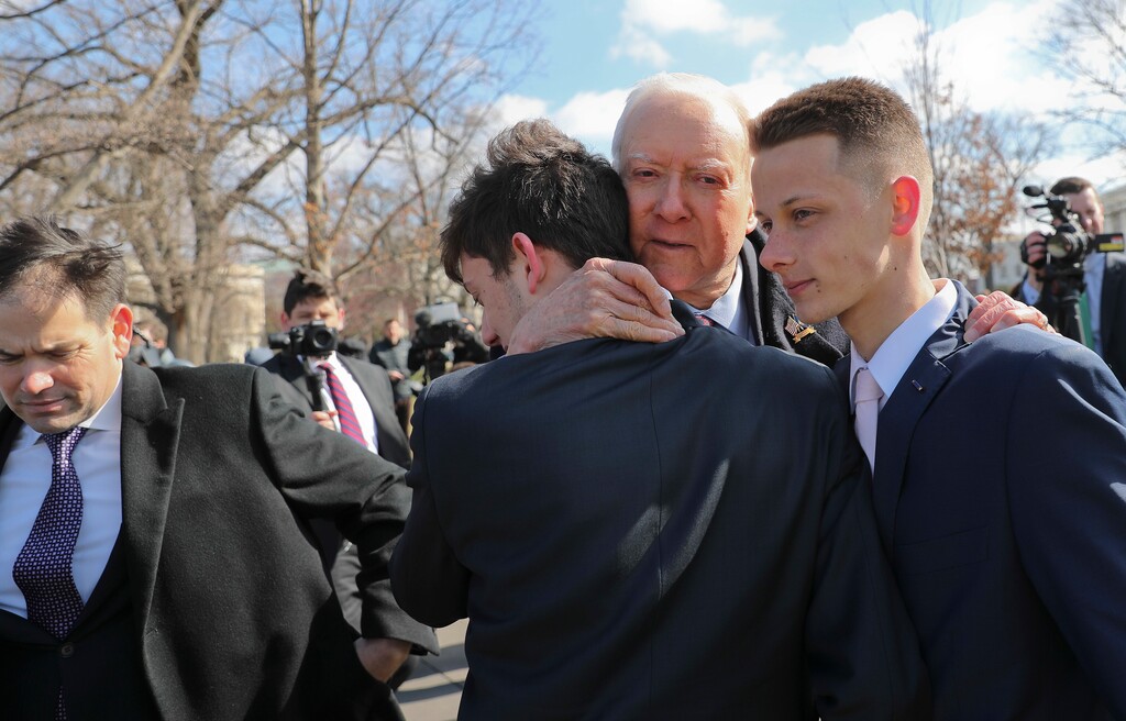 Sen. Orrin Hatch, R-Utah, center, hugs Kyle Kashuv, 16, and Patrick Petty, 17, both from Parkland, Fla., following a news conference on Capitol Hill in Washington, Tuesday, March 13, 2018. On the far left is Sen. Marco Rubio, R-Fla. Hatch is the lead sponsor of the school safety bill, aiming to replicate the success of a program in his home state of Utah. (AP Photo/Pablo Martinez Monsivais)