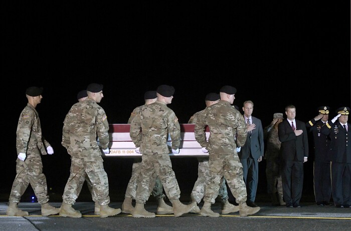 (Steve Ruark  |  AP Photo)  An Army carry team moves a transfer case containing the remains of Staff Sgt. Aaron R. Butler at Dover Air Force Base, Del., Friday, Aug. 18, 2017. According to the Department of Defense, Butler, of Monticello, Utah, died Aug. 16 in Nangarhar province, Afghanistan, of injuries sustained from an improvised explosive device while conducting combat operations.