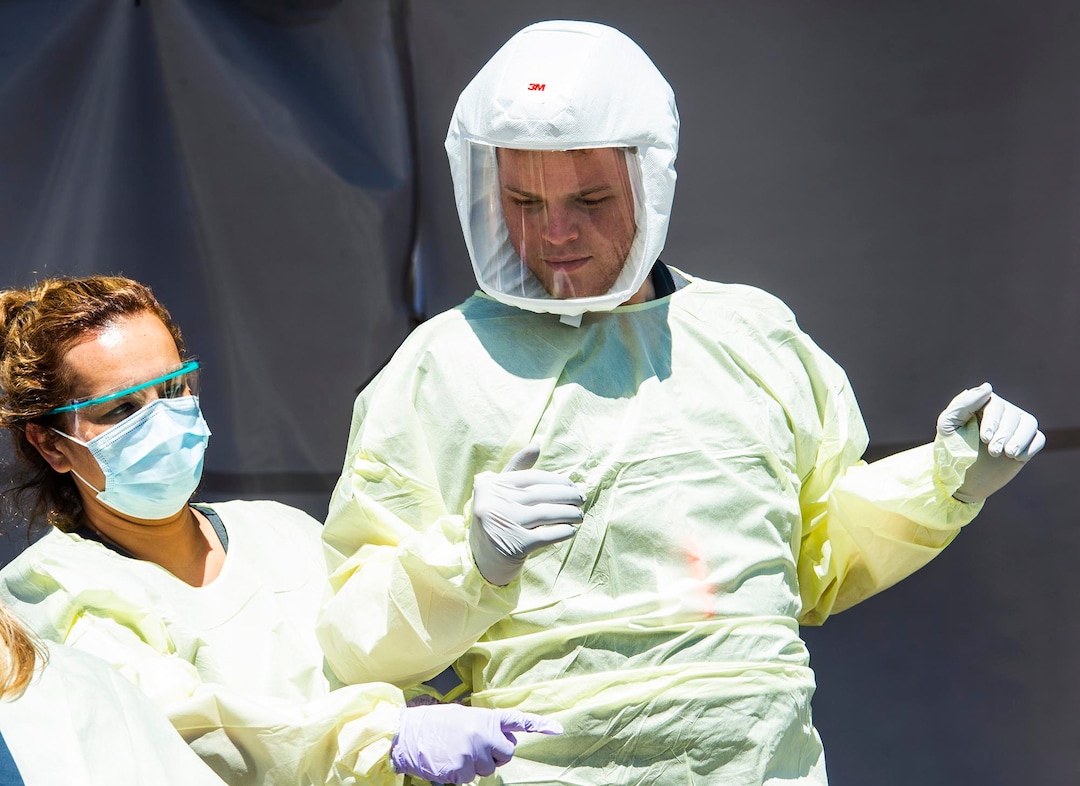 (Rick Egan  |  The Salt Lake Tribune)   Medical assists prepare for the next patient, at the Intermountain Healthcare Coronavirus Mobile Testing Unit at Utah Valley Hospital in Provo, Friday May 8, 2020.