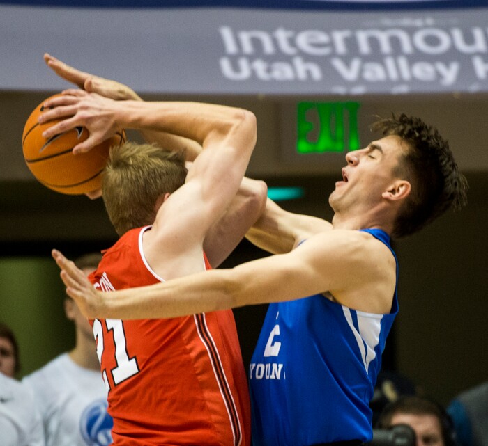 (Rick Egan  |  The Salt Lake Tribune) Brigham Young guard Zac Seljaas (2)  guards Utah Utes forward Tyler Rawson (21), in basketball action Utah Utes vs. Brigham Young Cougars at the Marriott Center in Provo, Saturday, December 15, 2017.


