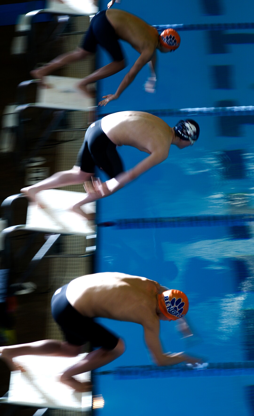 (Leah Hogsten  |  The Salt Lake Tribune)  Swimmers dive off the blocks in the 500 yard freestyle at the Class 5A State Championships in Bountiful, Saturday, February 10, 2018. 