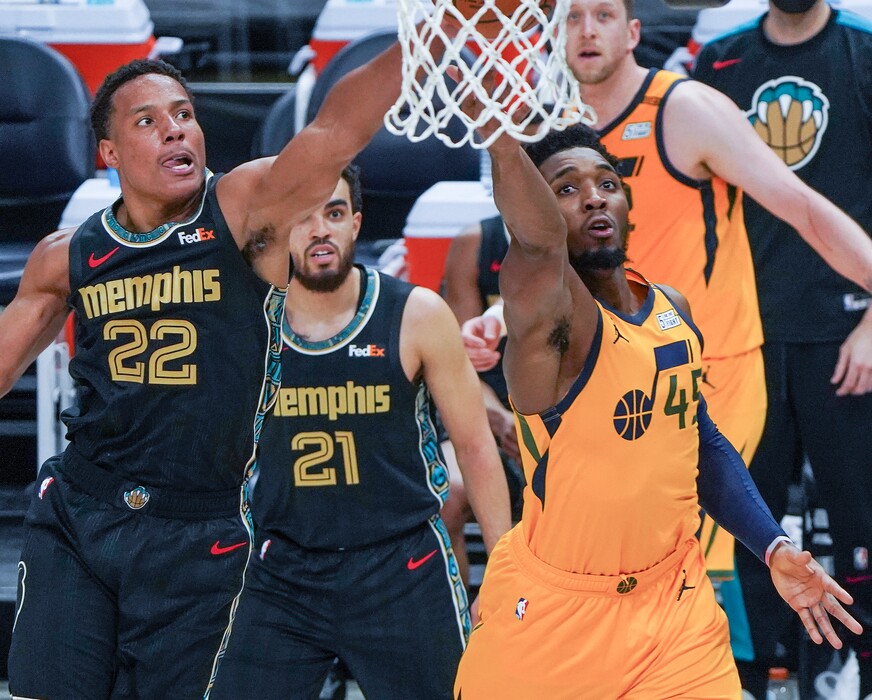 (Leah Hogsten | The Salt Lake Tribune)  Utah Jazz guard Donovan Mitchell (45) with the bucket as the Utah Jazz host the Memphis Grizzlies, Mar. 27, 2021 at Vivint Arena. 