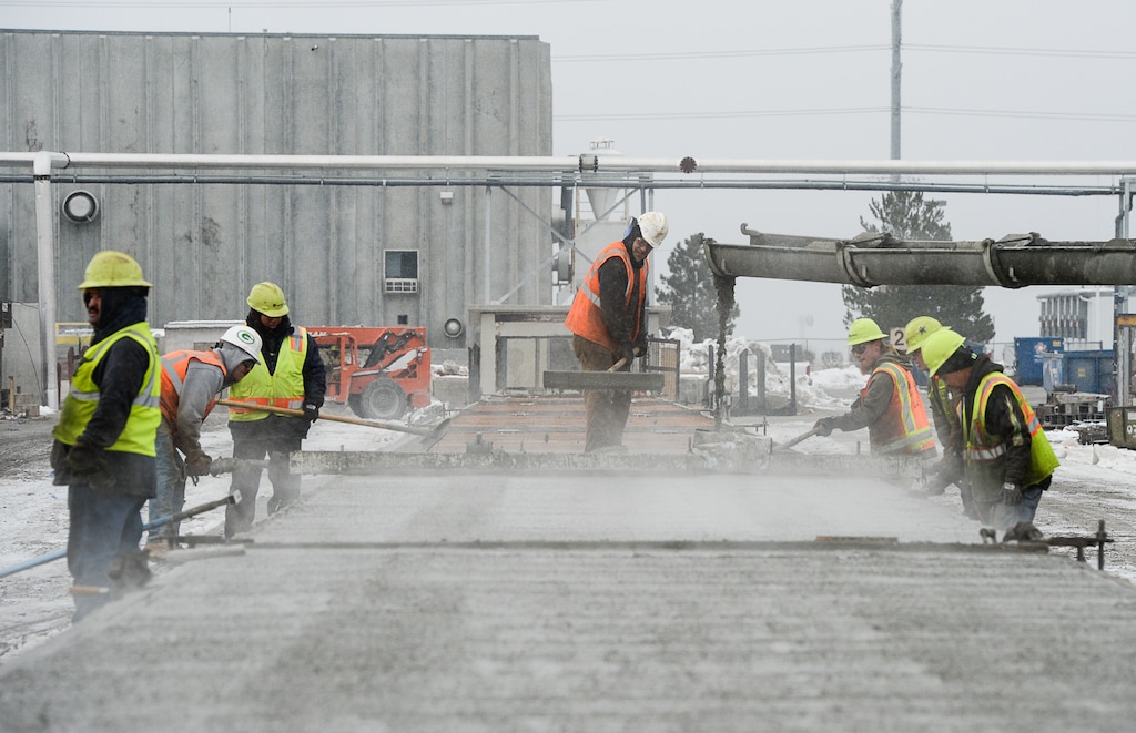 (Francisco Kjolseth | Tribune file) Crews lay down cement on a double T steel beam bridge structure at Forterra Structural Precast in Kearns on Dec. 11, 2018. The manufacturing industry helped lead the way as Utah ranks No. 2 in job creation over the past year.