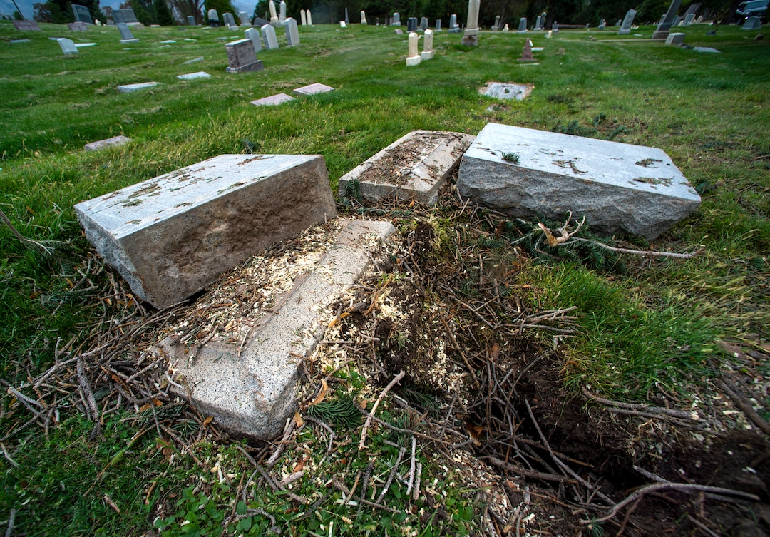 (Rick Egan  |  The Salt Lake Tribune)    Hundreds of headstones in the Salt Lake City Cemetery were damages in the recent wind storm, Friday, Sept. 18, 2020.