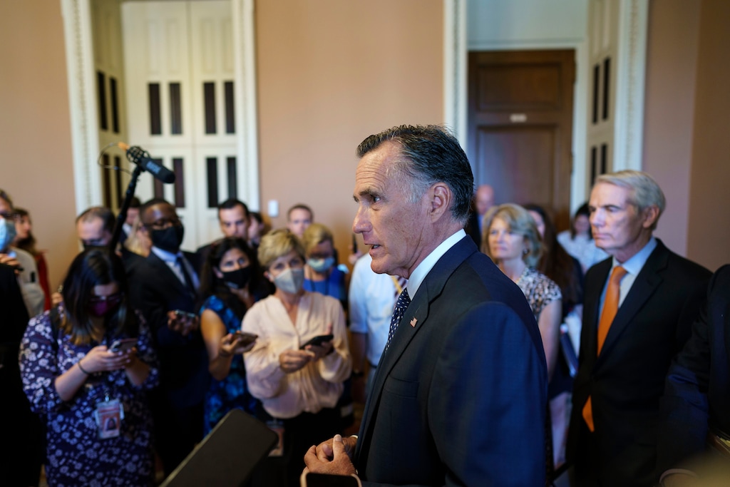 (J. Scott Applewhite | The Associated Press) Sen. Mitt Romney, R-Utah, center, and other Senate Republicans negotiating a $1 trillion infrastructure bill with Democrats, announce they have reached agreement on the major outstanding issues and are ready to vote to take up the bill, at the Capitol in Washington, Wednesday, July 28, 2021. Utah's House members are wary of the measure.