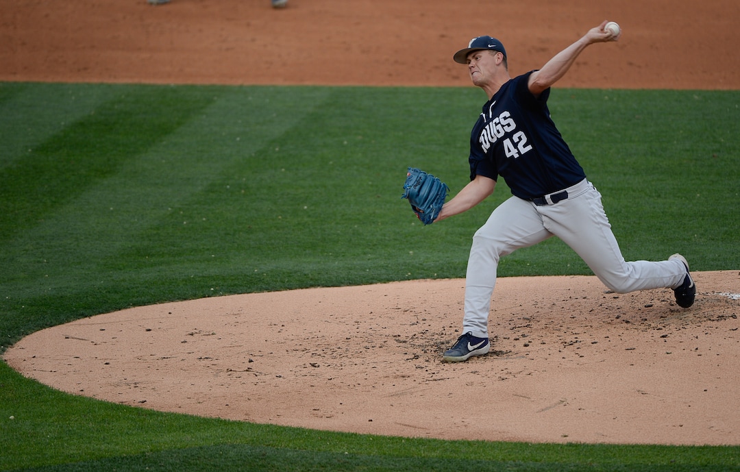 (Francisco Kjolseth  |  The Salt Lake Tribune)  Bo Burrup let's it fly as Utah and BYU renew their rivalry on the baseball diamond as they battle it out at Smith's Ballpark in Salt Lake City on Tuesday, May 14, 2019.