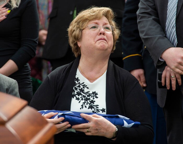 (Rick Egan  |  The Salt Lake Tribune)     Mary Ann Turner, the daughter of 2nd Lt. Lynn W. Hadfield, watches the helicopter fly-over during the graveside service for her father, who was killed during the Second World War, at Veterans Memorial Park, in Bluffdale. Thursday, March 21, 2019.


