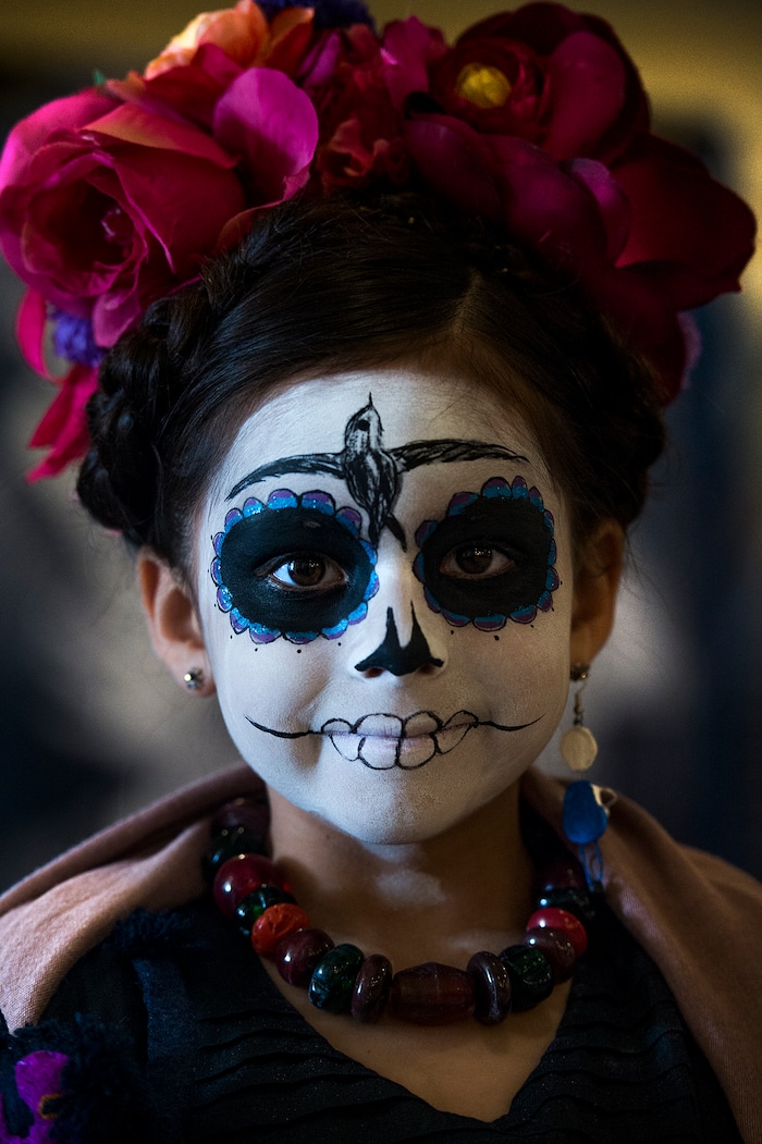 (Leah Hogsten | The Salt Lake Tribune) Maya Hadlock, 7, came dressed as Frida Kahlo as part of the Day of the Dead festival Saturday, October 21, 2017 at the Capitol.