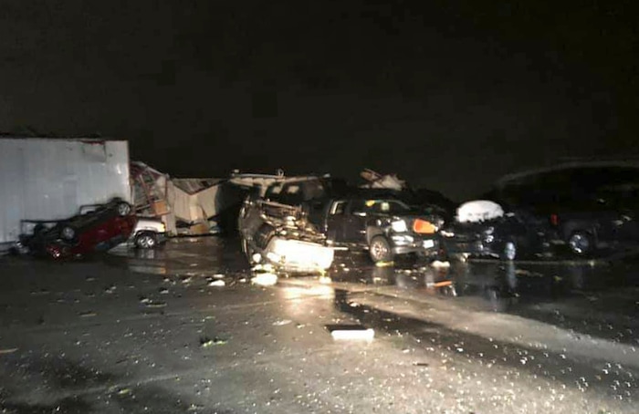(Photo courtesy of John Dolson) This image provided by John Dolson shows the damage of a car dealership in Jefferson City, MO., Thursday, May 23, 2019. A "violent tornado" touched down in Jefferson City, Missouri, causing possible fatalities, according to the National Weather Service.