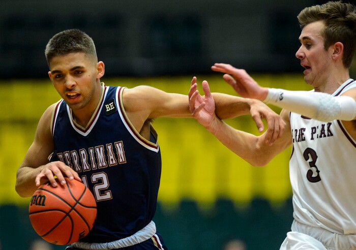 (Steve Griffin  |  The Salt Lake Tribune) Herriman's Jael Vaughn tires to fend off Lone Peak defender Steven Ashworth during 6A basketball playoff game at the Utah Valley UniversityÕs UCCU Center in Provo Tuesday Feb. 27, 2018.