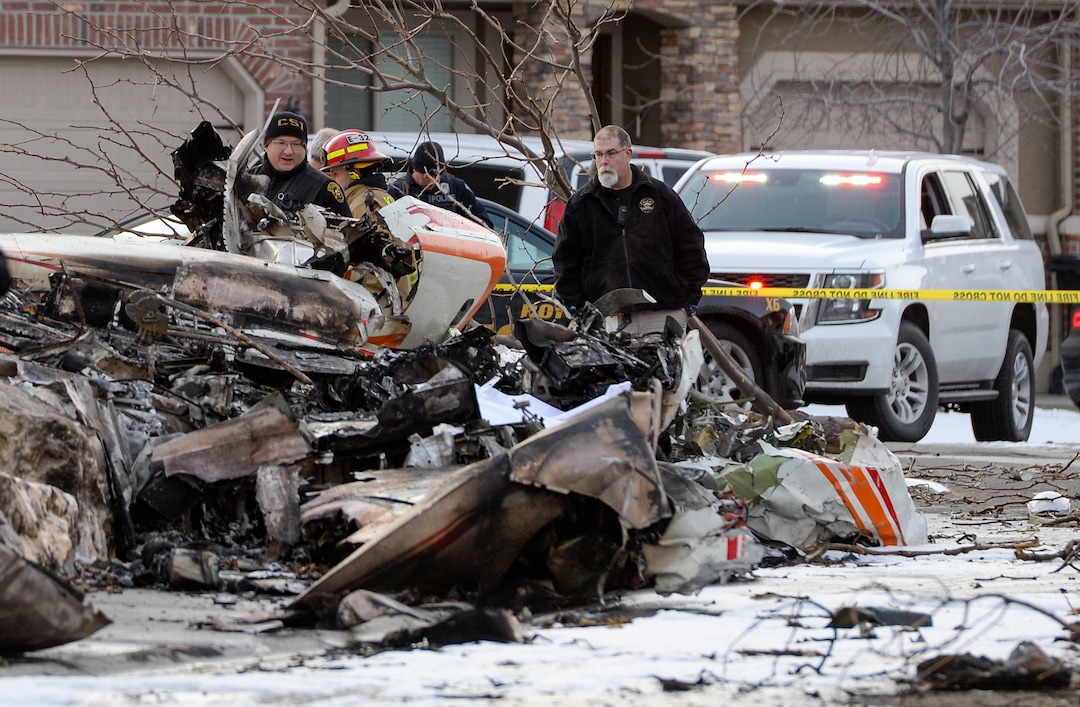 (Leah Hogsten  |  The Salt Lake Tribune) Weber County emergency personnel and firefighters work the scene of a small, private plane that crashed in a residential neighborhood in Roy, Jan 15, 2020.  A 64-year-old pilot was killed.
