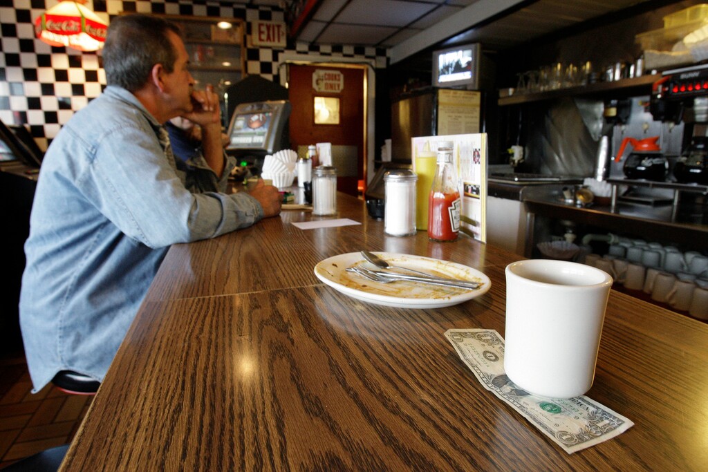 FILE - In this June 19, 2008 file photo, a tip is left by a customer at Linda's Place Restaurant in St. Clair Shores, Mich. (AP Photo/Paul Sancya, file)