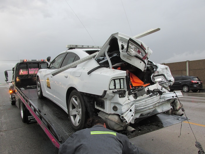 (Courtesy Utah Highway Patrol) A pickup truck slammed into the rear end of a Utah Highway Patrol patrol car early Friday, leaving a trooper with minor injuries.