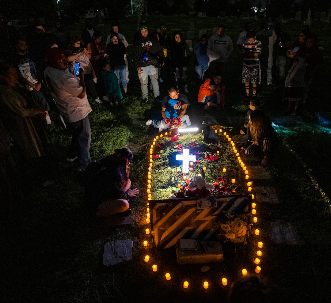 (Rick Egan | The Salt Lake Tribune) Family and friends of Bernardo Palacios-Carbajal gather at Bernardo's grave in the Salt Lake City Cemetery, after the "Long Live Loske" gathering at Rose Park on Saturday, May 22, 2021. The family of Bernardo Palacios-Carbajal hosted a "1st Heavenly Anniversary" event to celebrate the life of their son and brother to mark the 1-year anniversary of his death on May 23, 2020 by Salt Lake City Police, who fired 34 shots, killing the 22-year-old man.