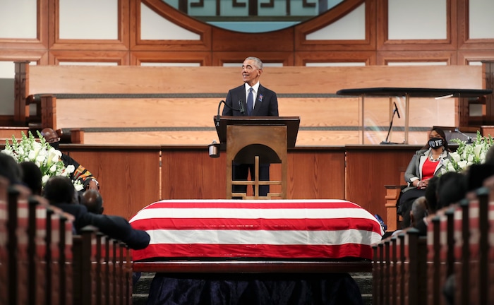 Former President Barack Obama, addresses the service during the funeral for the late Rep. John Lewis, D-Ga., at Ebenezer Baptist Church in Atlanta, Thursday, July 30, 2020. (Alyssa Pointer/Atlanta Journal-Constitution via AP, Pool)