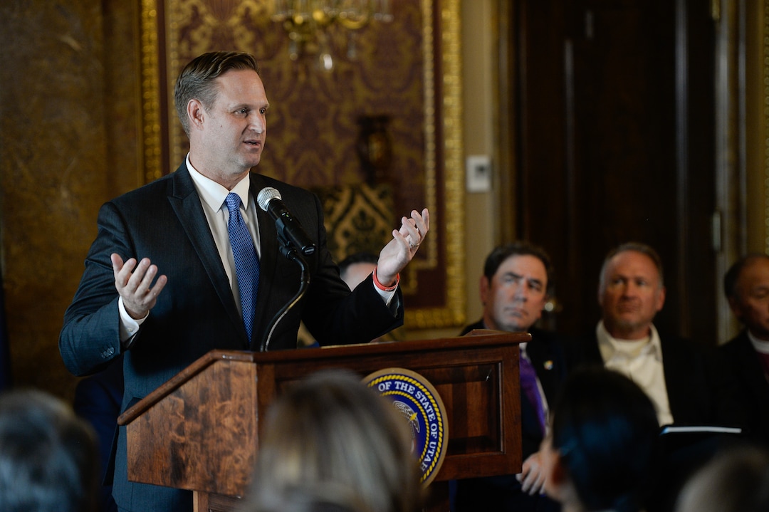 (Francisco Kjolseth  |  The Salt Lake Tribune)  Utah Patients Coalition director DJ Schanz joins supporters and opponents of UtahÕs medical marijuana initiative to say a few words with Utah Gov. Gary Herbert and legislative leaders Thursday, Oct. 4, 2018, at the Utah Capitol where they announced a Òshared visionÓ for cannabis policy.