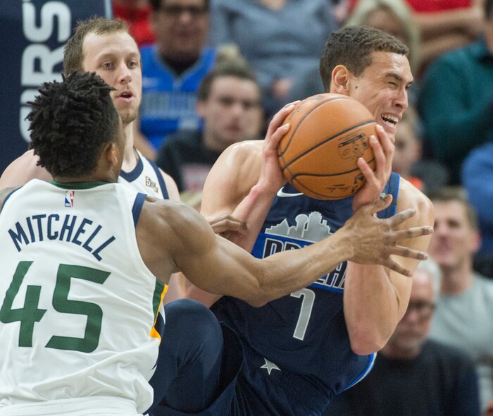 (Rick Egan  |  The Salt Lake Tribune)    Utah Jazz guard Donovan Mitchell (45) defends asDallas Mavericks guard Dennis Smith Jr. (1) breaks for the basket, in NBA action between Utah Jazz and Dallas Mavericks in Salt Lake City, Saturday, Feb. 24, 2018.