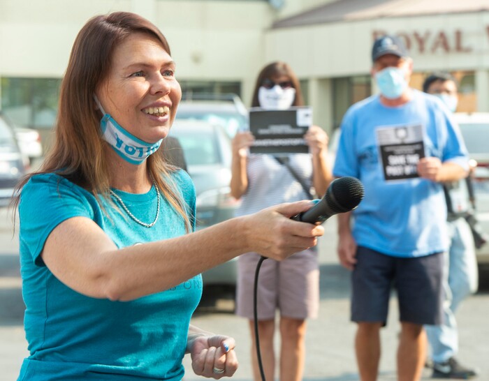 (Rick Egan  |  The Salt Lake Tribune)    Jamie Carter leads protesters in a chant, during a rally to "Save the Post Office," hosted by Alliance for a Better Utah, NAACP Salt Lake Branch, League of Women Voters at the Post Office on 200 South in Salt Lake City, Saturday, Aug. 22, 2020.