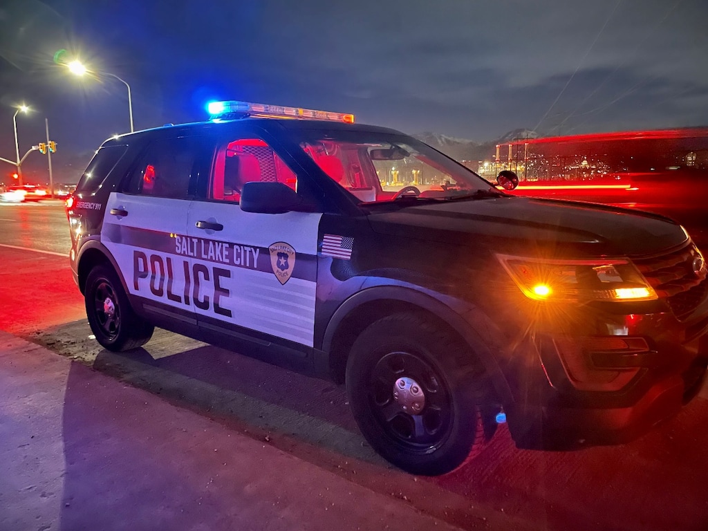 (Salt Lake City Police Department) A Salt Lake City patrol vehicle at a crime scene. Salt Lake City police on Saturday, Sept. 17. 2022, arrested a 32-year-old man suspected of stabbing two people experiencing homelessness this month.