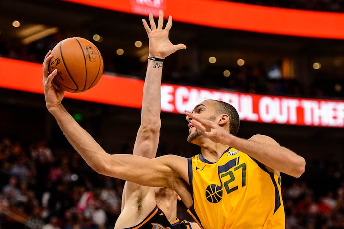 (Trent Nelson | The Salt Lake Tribune)  Utah Jazz center Rudy Gobert (27) shoots over Phoenix Suns center Alex Len (21) as the Utah Jazz host the Phoenix Suns, NBA basketball in Salt Lake City, Wednesday Feb. 14, 2018.