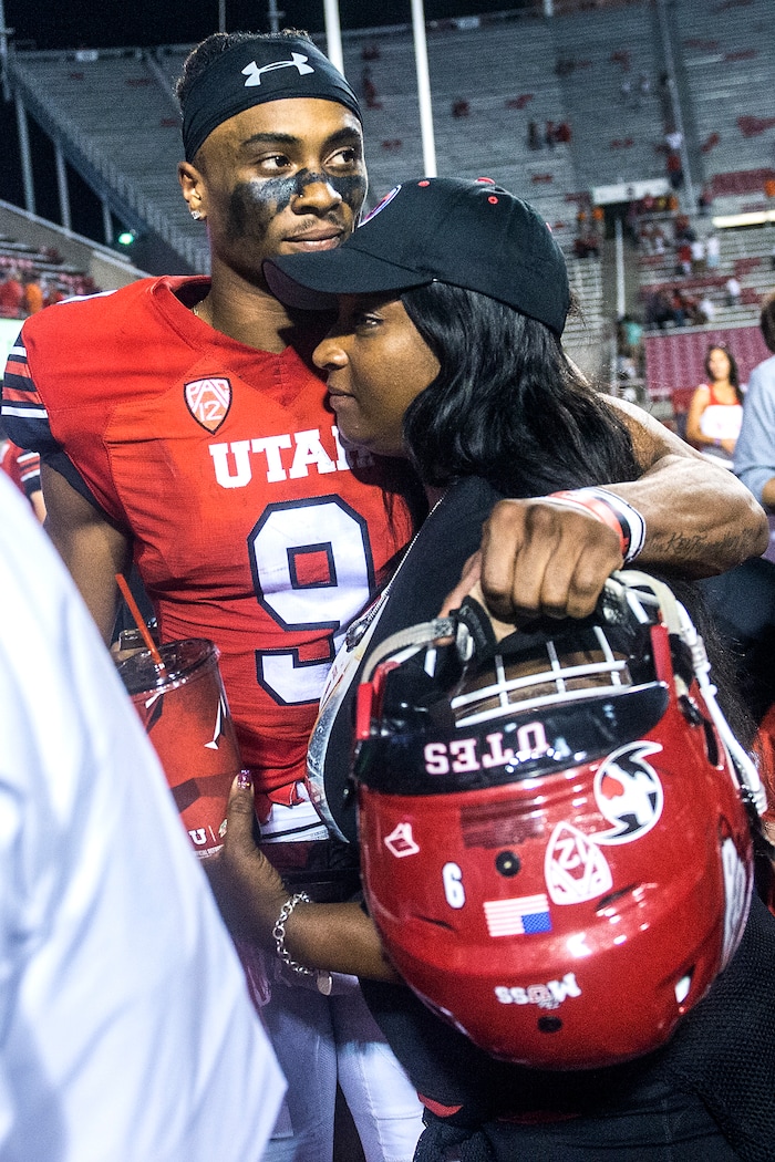 (Chris Detrick | The Salt Lake Tribune) Utah Utes wide receiver Darren Carrington (9) hugs his mom Vickie Carrington after the game at Rice-Eccles Stadium Thursday, August 31, 2017. Utah Utes defeated North Dakota Fighting Hawks 37-16.