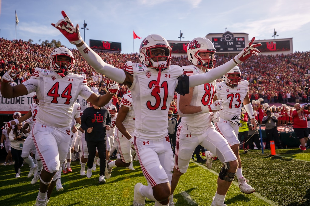 (Trent Nelson  |  The Salt Lake Tribune) Utah takes the field as the Utah Utes face the Ohio State Buckeyes at the Rose Bowl in Pasadena, Calif., on Saturday, Jan. 1, 2022.