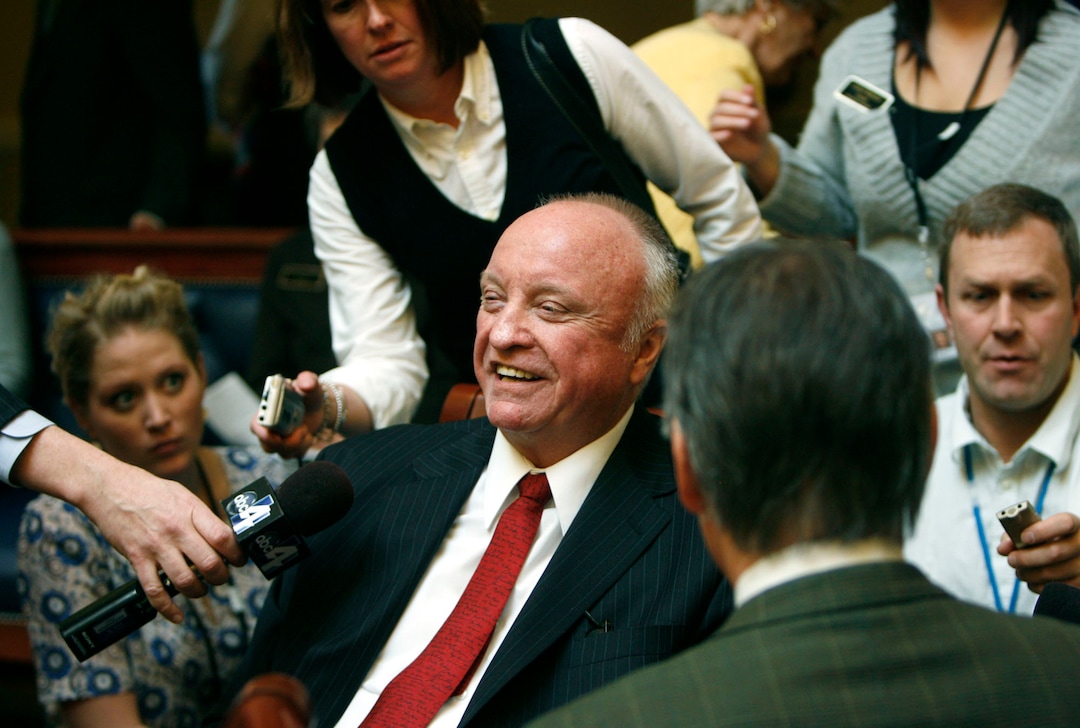 (Scott Sommerdorf  |  Tribune file photo)  In this 2009 file photo, Senator Chris Buttars, R-West Jordan, is surrounded by reporters as he took his seat on the floor of the Utah Senate just minutes after he was stripped of his chairmanship of the Senate Judiciary Committee by President Waddoups.  Buttars died Sept. 10, 2018, of complications from diabetes. He was 76.