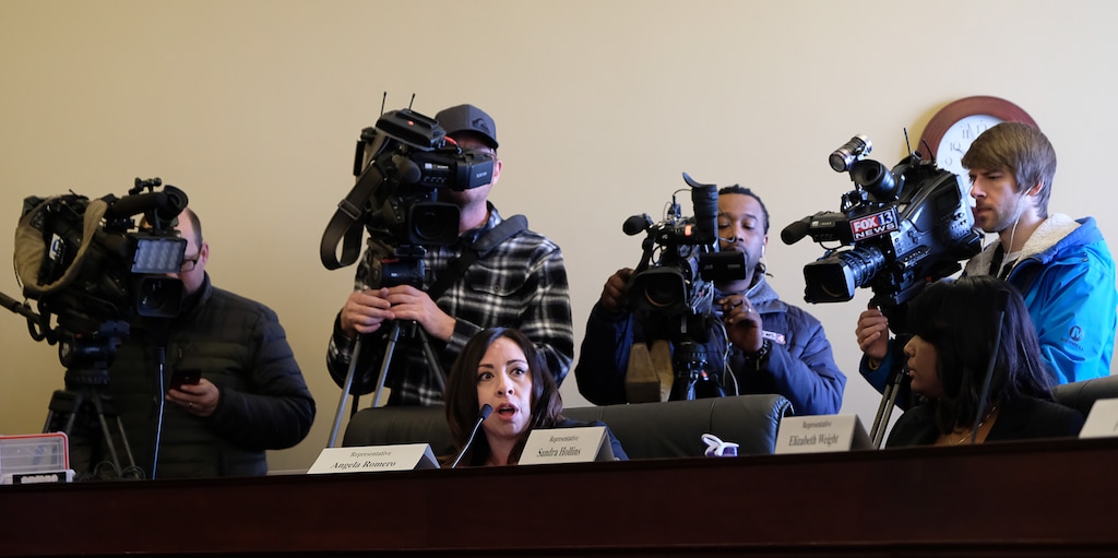 (Francisco Kjolseth  |  The Salt Lake Tribune)  TV cameras swarm Rep. Angela Romero, D-Salt Lake City, Wednesday for a debate over ending the death penalty. House members noted the absence of cameras when lawmakers took up discussion of a noncompete bill that is opposed by Utah's four main television stations.