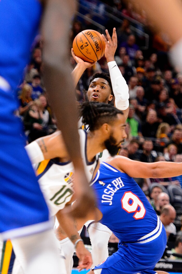 (Trent Nelson  |  The Salt Lake Tribune) Utah Jazz guard Donovan Mitchell (45) shoots as the Utah Jazz host the Sacramento Kings, NBA basketball in Salt Lake City on Saturday, Jan. 18, 2020.