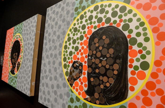 (Leah Hogsten  |  The Salt Lake Tribune) Artist Kerry James MarshallÕs ÔDiptych Color Blin Test, 2003Õ acrylic paint on MDF panels was inspired by Marcus GarveyÕs African flag. ÒMarshall uses red, green, and gray dots of various sizes to recall the Ishihara test, which is used to measure the human ability to distinguish between colors. The artist uses this reference to encourage viewers to consider the notion of a color-blind societyÓ - UMFA. The Utah Museum of Fine ArtsÕ new exhibit: "Power Couples: The Pendant Format in Art," open now through December 8, 2019. ÒPower Couples explores how artists have used the pendant format across media, cultures and time periods to explore gender roles and social status; to present moments of before-and-after, cause-and-effect and departure-and-return; and to compare and contrast familiar stories and ideas.Ó -UMFA