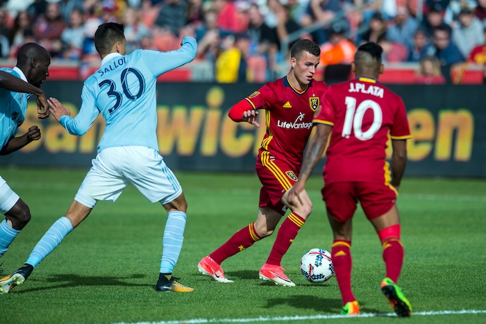(Chris Detrick  |  The Salt Lake Tribune)  Real Salt Lake forward Brooks Lennon (27) runs past Sporting Kansas City forward Daniel Salloi (30) during the game at Rio Tinto Stadium Sunday, October 22, 2017.  