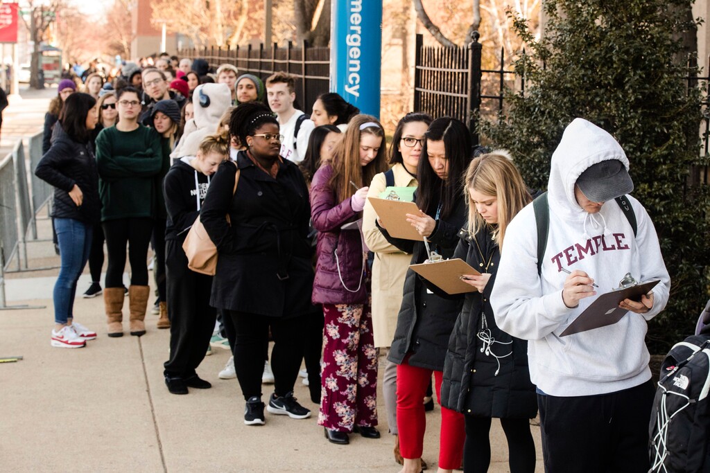 (AP Photo/Matt Rourke) A line of mostly students wait to enter a vaccination clinic amid a mumps outbreak on the Temple University campus in Philadelphia, Wednesday, March 27, 2019. Health officials say the MMR vaccine, for measles, mumps and rubella, will be available to all Temple students, faculty and staff on Wednesday and Friday.