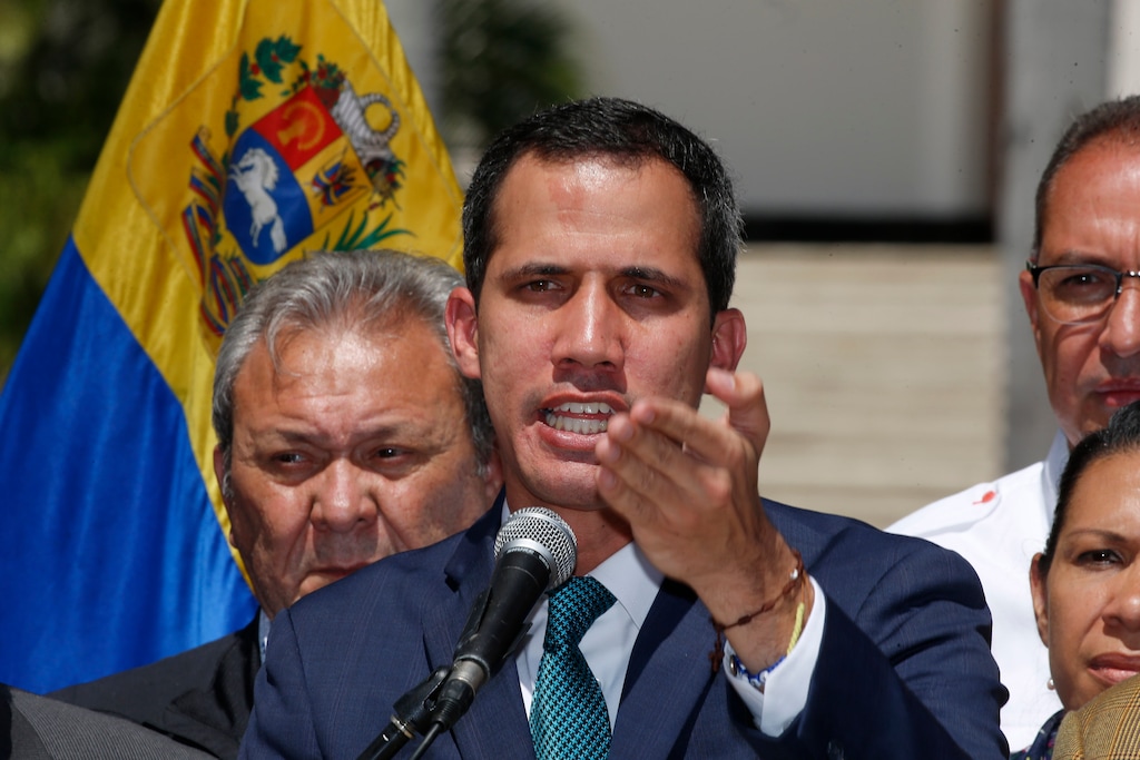 Opposition leader Juan Guaido, who has declared himself the interim president of Venezuela, speaks during a press conference on the steps of the National Assembly in Caracas, Venezuela, Monday, Feb. 4, 2019. Germany, Spain, France, the U.K. and Sweden have announced that they are recognizing Guaido as the country's interim president and are urging him to hold a new presidential election. (AP Photo/Fernando Llano)