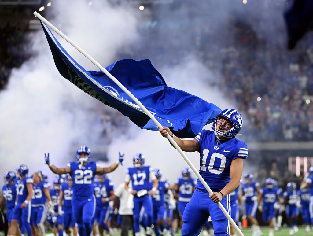 (David Becker | AP) BYU quarterback Sol-Jay Maiava-Peters (10) cheers as the team takes the field before an NCAA college football game against Arizona Saturday, Sept. 4, 2021, in Las Vegas.