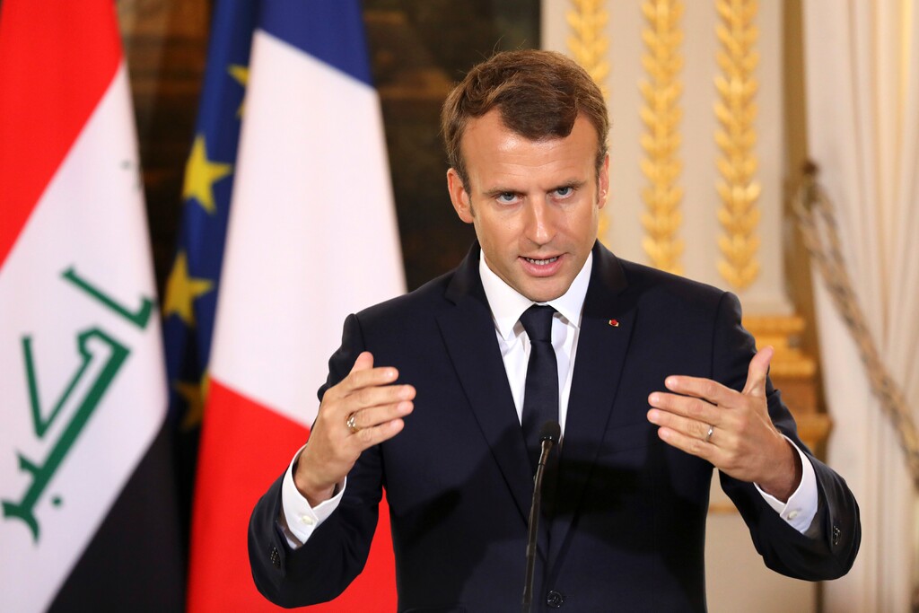 French president Emmanuel Macron delivers his speech during a joint press conference with Iraqi Prime minister Haider al-Abadi at the Elysee palace in Paris, Thursday, Oct. 5, 2017. Macron offers mediation between Iraq's government and Kurds seeking independence. (Ludovic Marin, Pool via AP)
