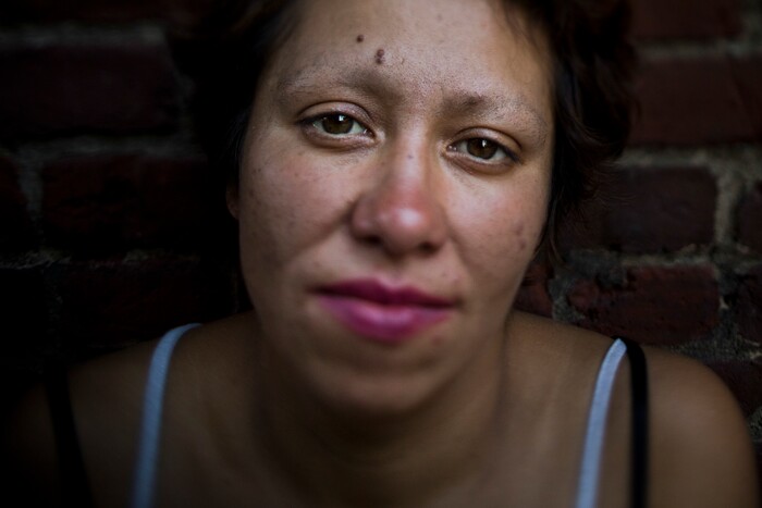(Jae C. Hong | The Associated Press) Alicia Adara, 33, poses for a photo Wednesday, Sept. 27, 2017, in Seattle. Adara said she ended up on the street after losing a custody fight for her two children with her ex-husband. "I don't do shelters. I feel like I'm in jail," she said. "I've been like basically a prisoner all my life. I need to do this. I need to be out here. It's freedom."