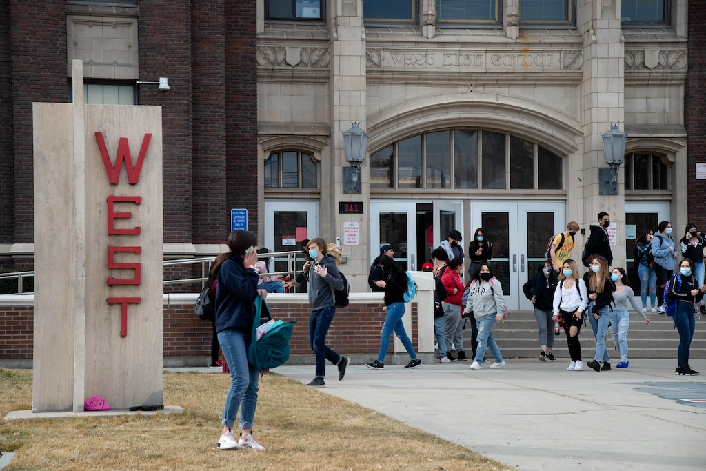 (Francisco Kjolseth |The Salt Lake Tribune) West High students conclude their day on Thursday, Feb. 11, 2021. A student at the school, Arundhati Oommen, is pushing for her peers age 16 and older to be able to vote in local school board elections.