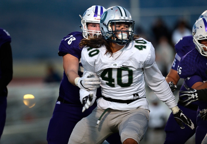 (Scott Sommerdorf   |  The Salt Lake Tribune)   Olympus DE Cameron Latu during first half play. Lehi led Olympus 26-0 late in the second half, Friday, September 22, 2017.