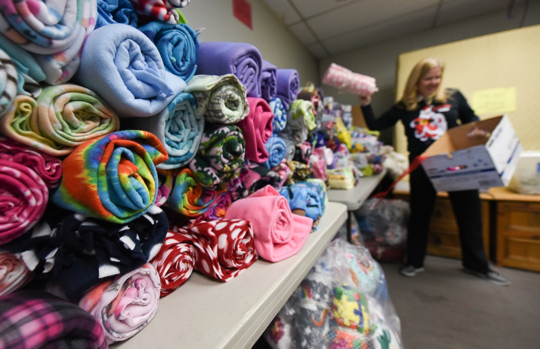 (Francisco Kjolseth  |  The Salt Lake Tribune)  Sandra Clayson assembles Christmas care packages for those in need as part of the Granite Education Foundation's Santa Sacks program created in 2009. Working with social workers who know each of the students individually in the lowest of income families across 60 schools in the Granite district, volunteers expect to fill over 3000 sacks.