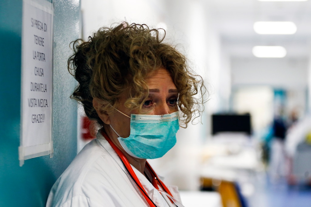 (Cecilia Fabiano | LaPresse) A medical staffer works at the Santo Spirito hospital in Rome, Monday, March 30, 2020. The new coronavirus causes mild or moderate symptoms for most people, but for some, especially older adults and people with existing health problems, it can cause more severe illness or death.