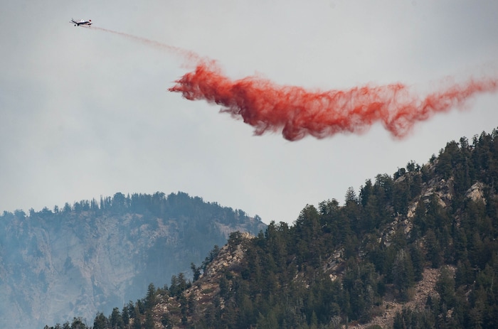 (Francisco Kjolseth  |  The Salt Lake Tribune) Air crews battle a fire in Neffs Canyon on the north side of Mount Olympus on Tuesday, Sept, 22, 2020.