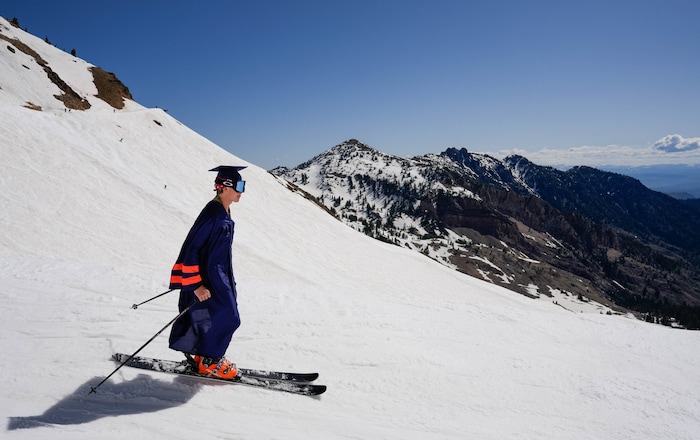 (Francisco Kjolseth  | The Salt Lake Tribune) Brighton High School graduate Andrew Quilter hits Mineral Basin as Snowbird closes the book on the 2024-25 ski season on Monday, May 26, 2025. Snow and sun revelers took to the slushy slopes on Memorial Day as the resort was the last in the state to close.
