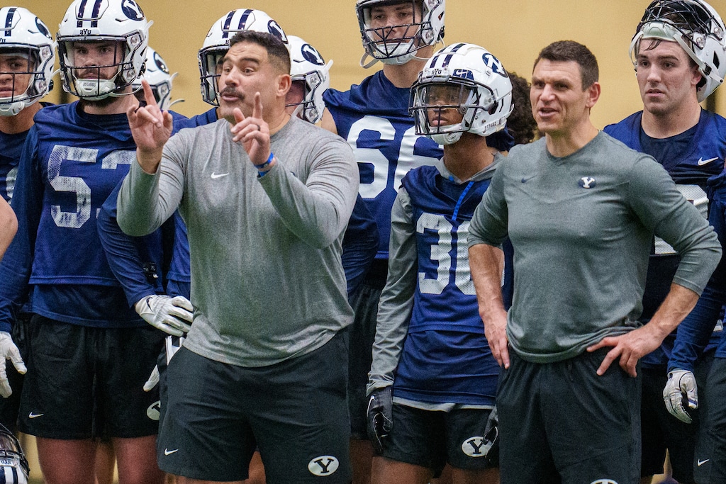 (Trent Nelson  |  The Salt Lake Tribune) Linebackers coach Justin Ena and special team coordinator Kelly Poppinga at BYU football practice in Provo on Monday, March 6, 2023.