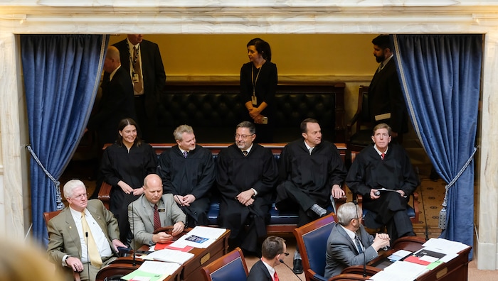 (Francisco Kjolseth | The Salt Lake Tribune) Supreme Court justices Paige Petersen, John A. Pearce, Constandinos Himonas, Thomas R. Lee and Chief Justice Matthew B. Durrant, from left, gather on the senate floor for the start of the 2018 legislative session and to give the state of the judiciary address by Chief Justice Durrant on Monday, Jan. 22, 2018.